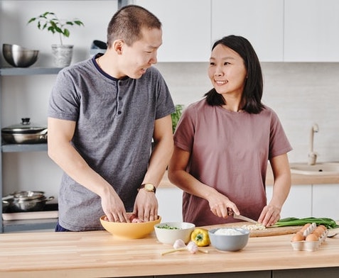 couple cooking together